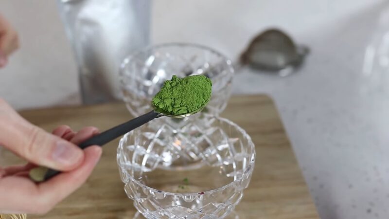 MATCHA powder in a spoon